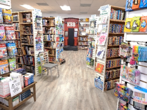 Interior of a bookstore with many shelves lined with books.